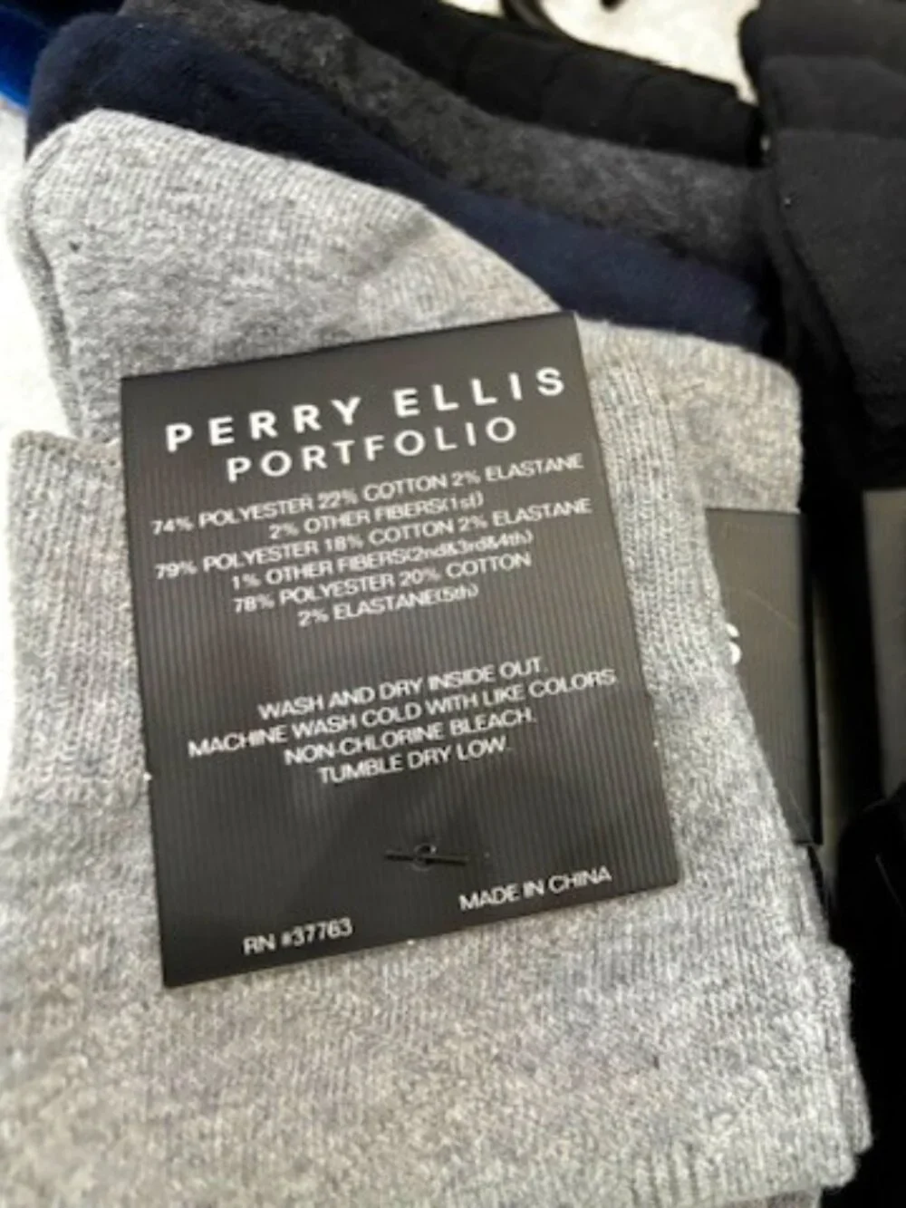 13 pairs of socks - 10 from Perry Ellis Portfolio and 3 novelty print crews NWY